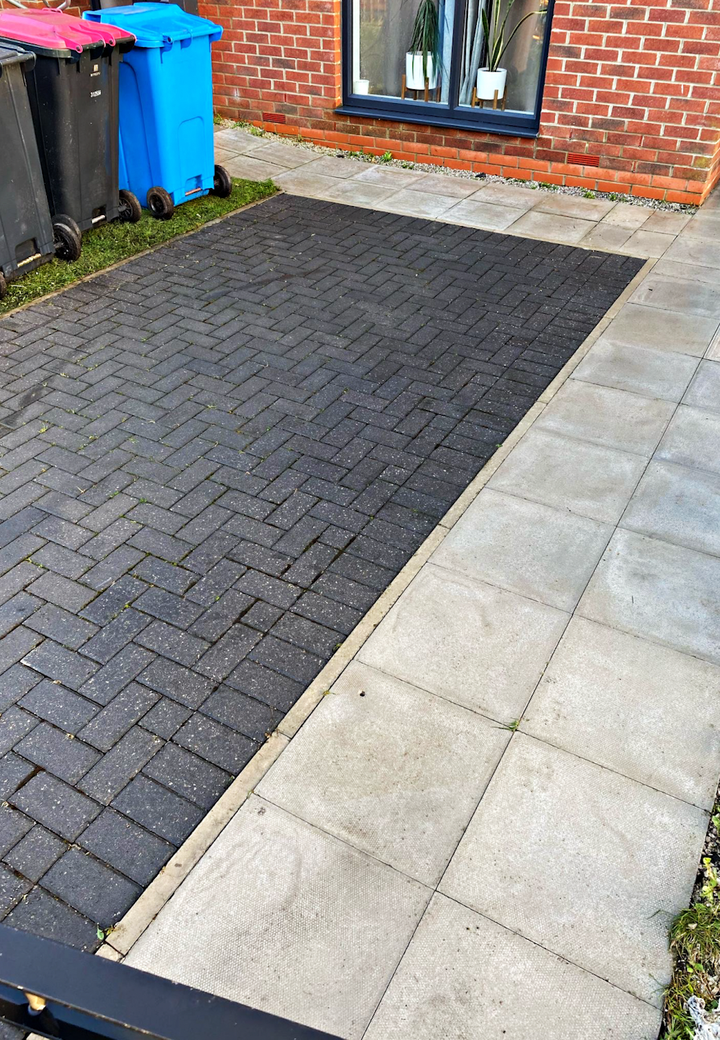 Clean driveway after pressure washing